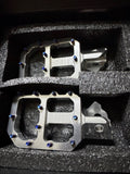 Titanium chrome wide pegs